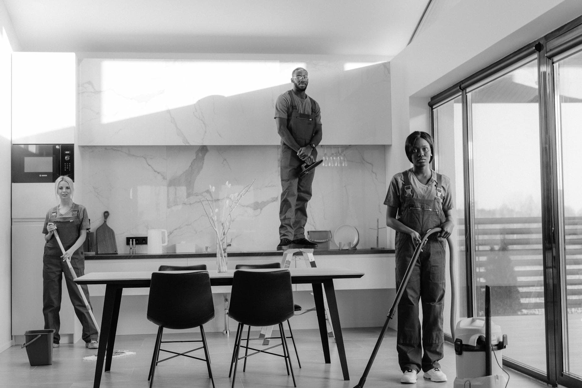 Professional NYC Maid team working in a modern dining room in New York City — Office Cleaning in Willowbrook, Staten Island